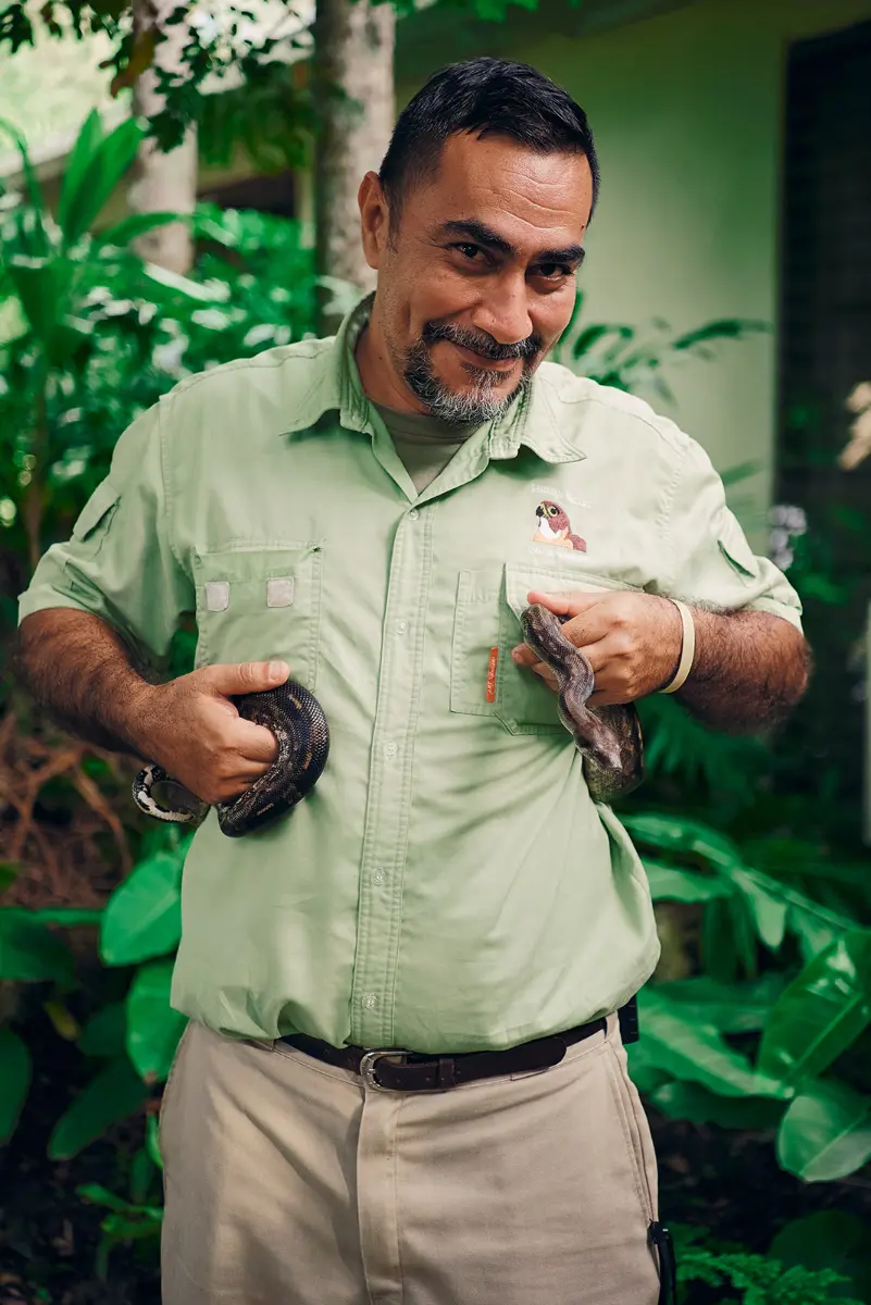 belize guide with snake in hand