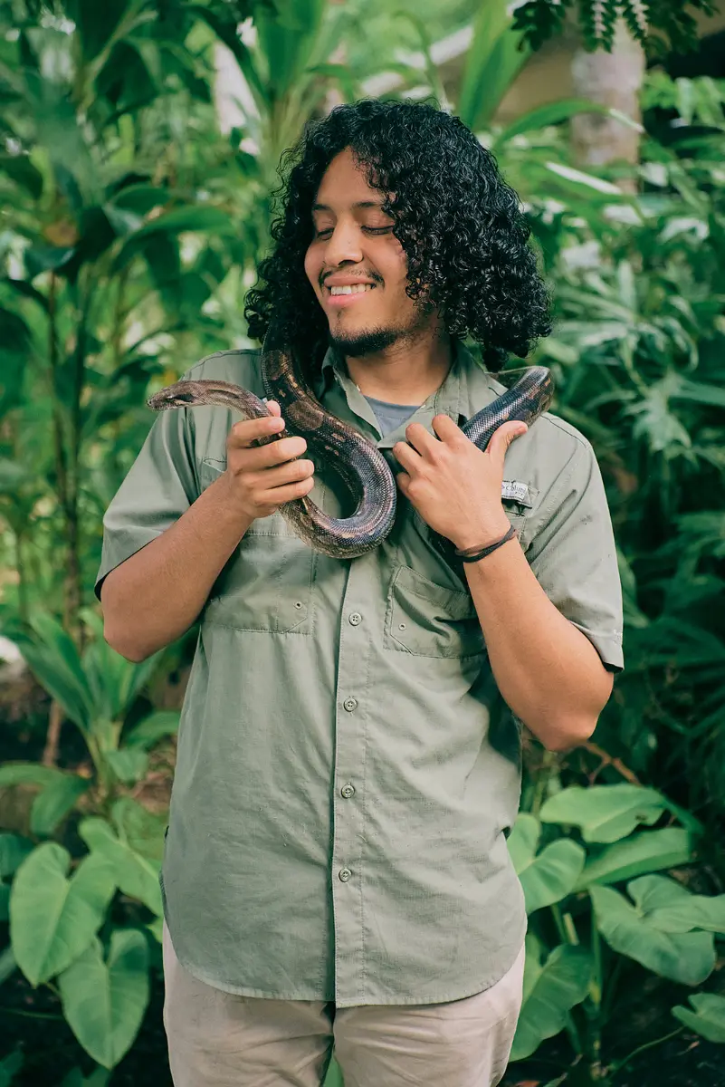 belize guide with snake in hand